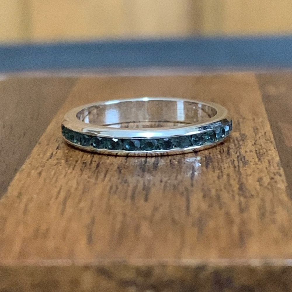 Silver tone band with blue rhinestones size 5.5